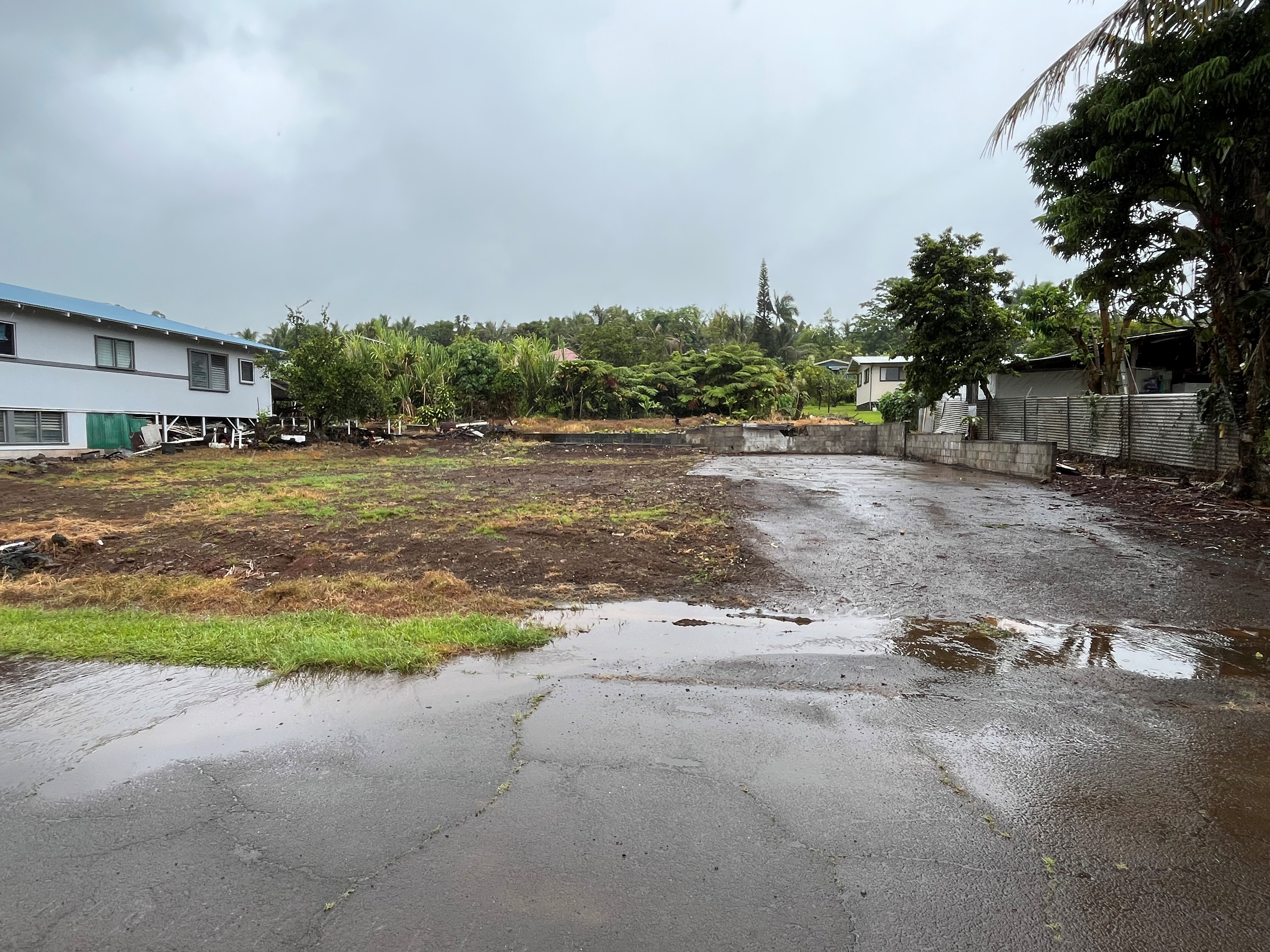 a view of a street with a yard