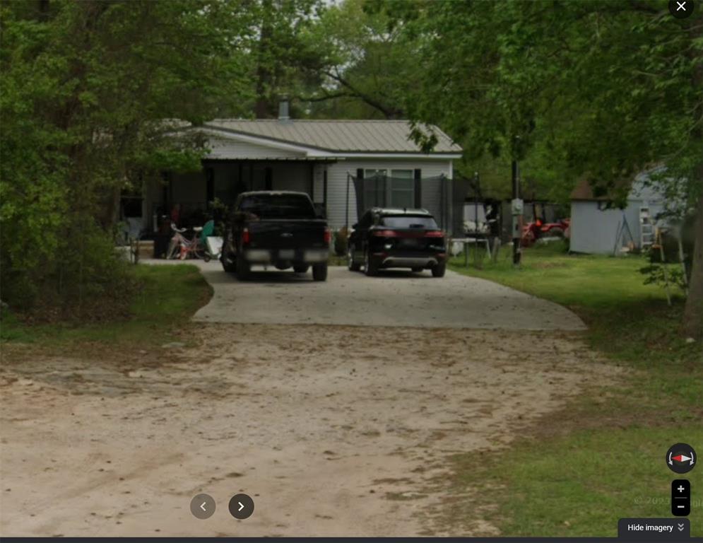 a car parked in front of a house