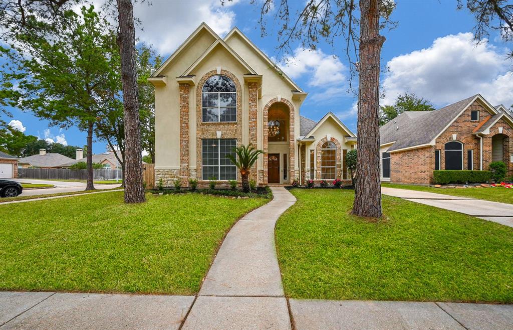 Beautifully remodelled home on corner lot and cul-de-sac street!  Freshly painted exterior and brand new roof!