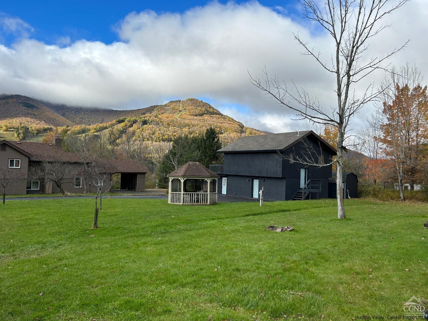 a view of a house with a big yard