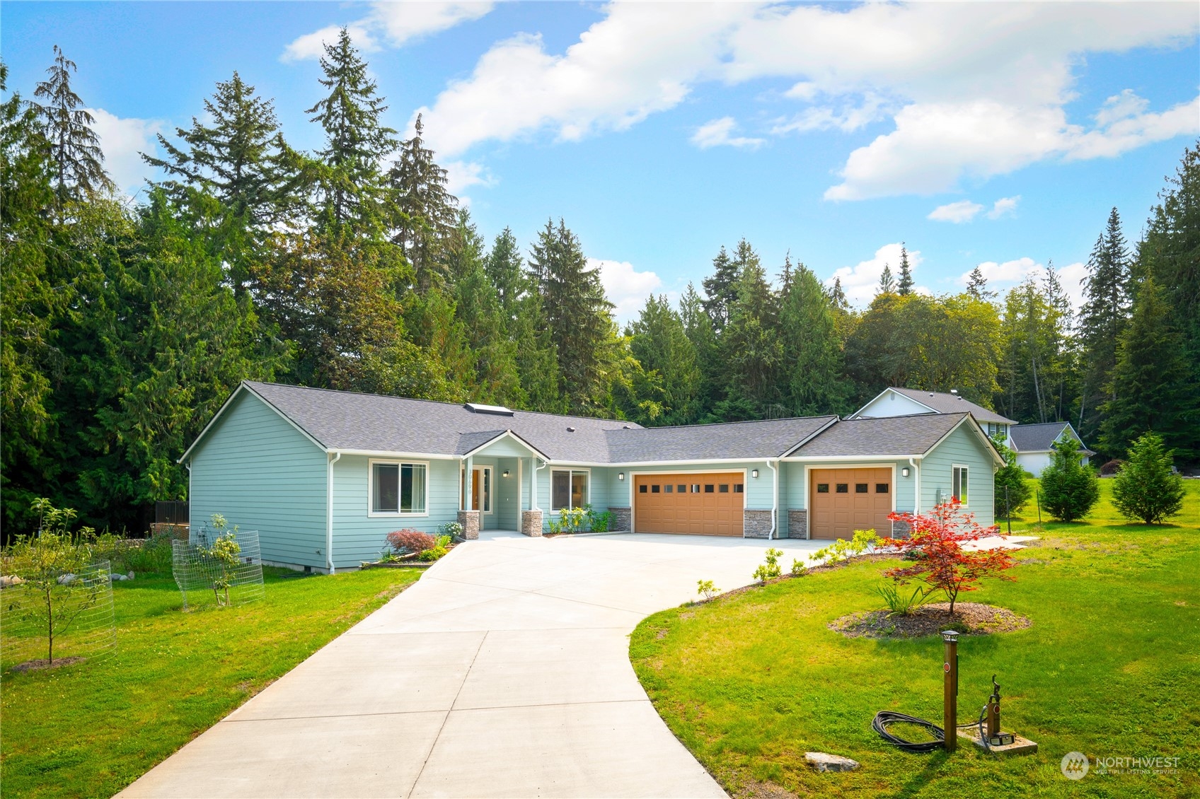 a front view of house with yard porch and green space