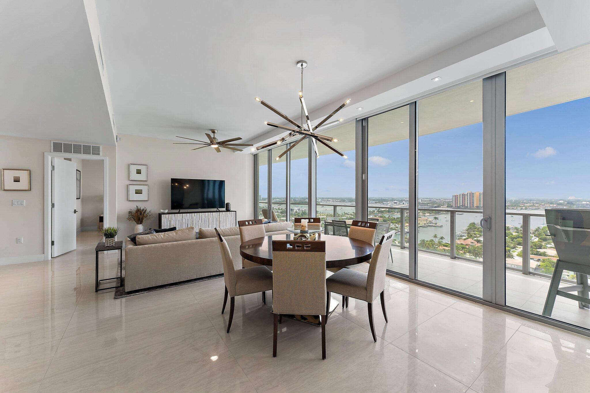 a view of a dining room with furniture window and outside view