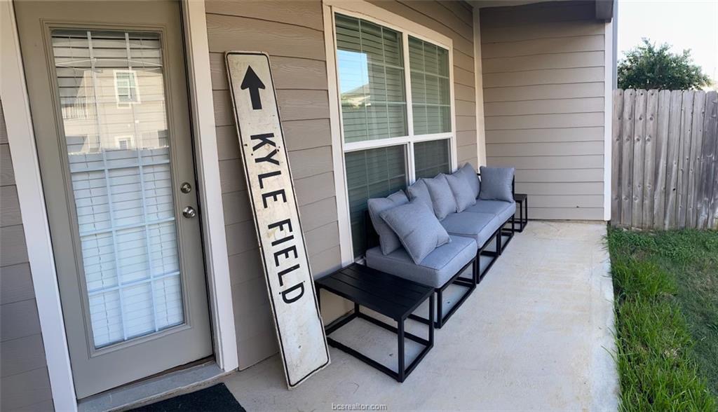 a view of a bench in front of house