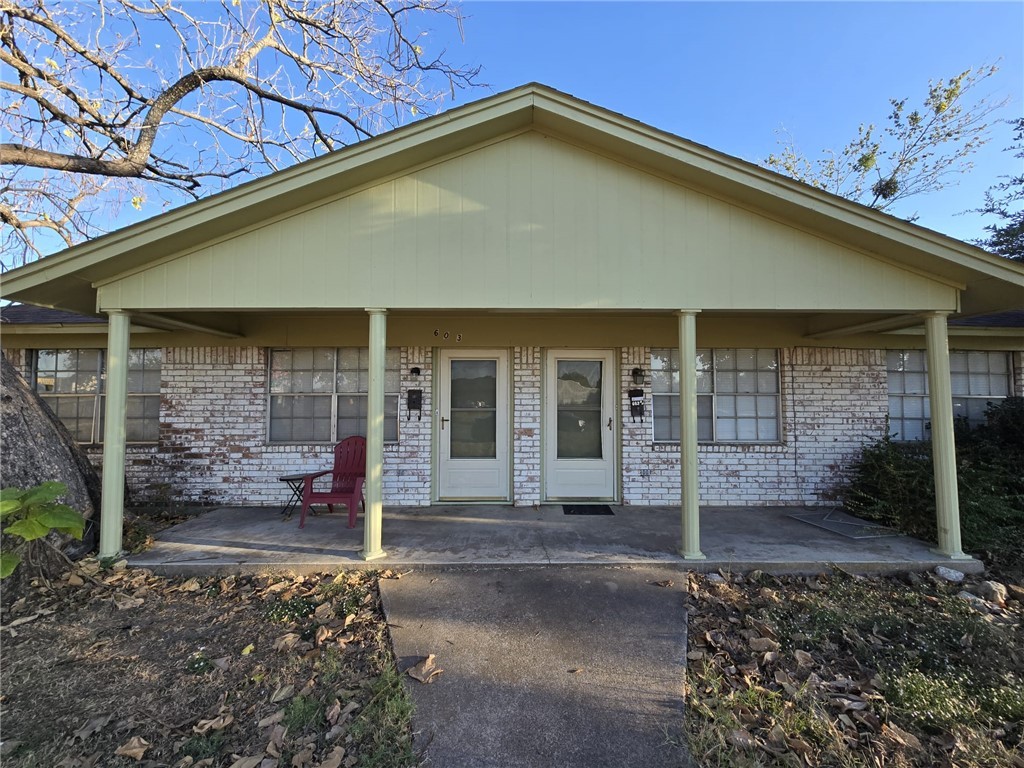 a front view of a house with porch