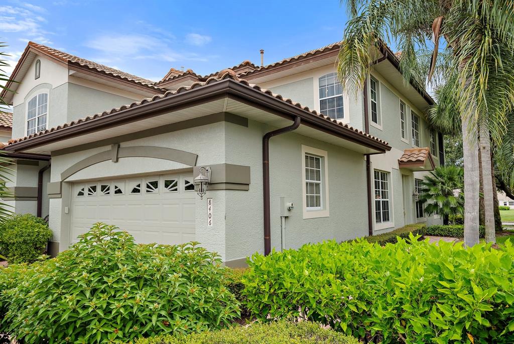 front view of a house with a small yard