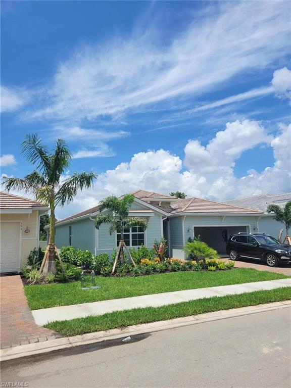 front view of a house with a street