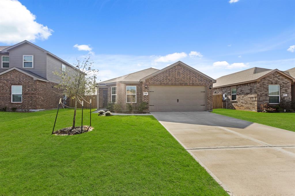 a house view with a garden space