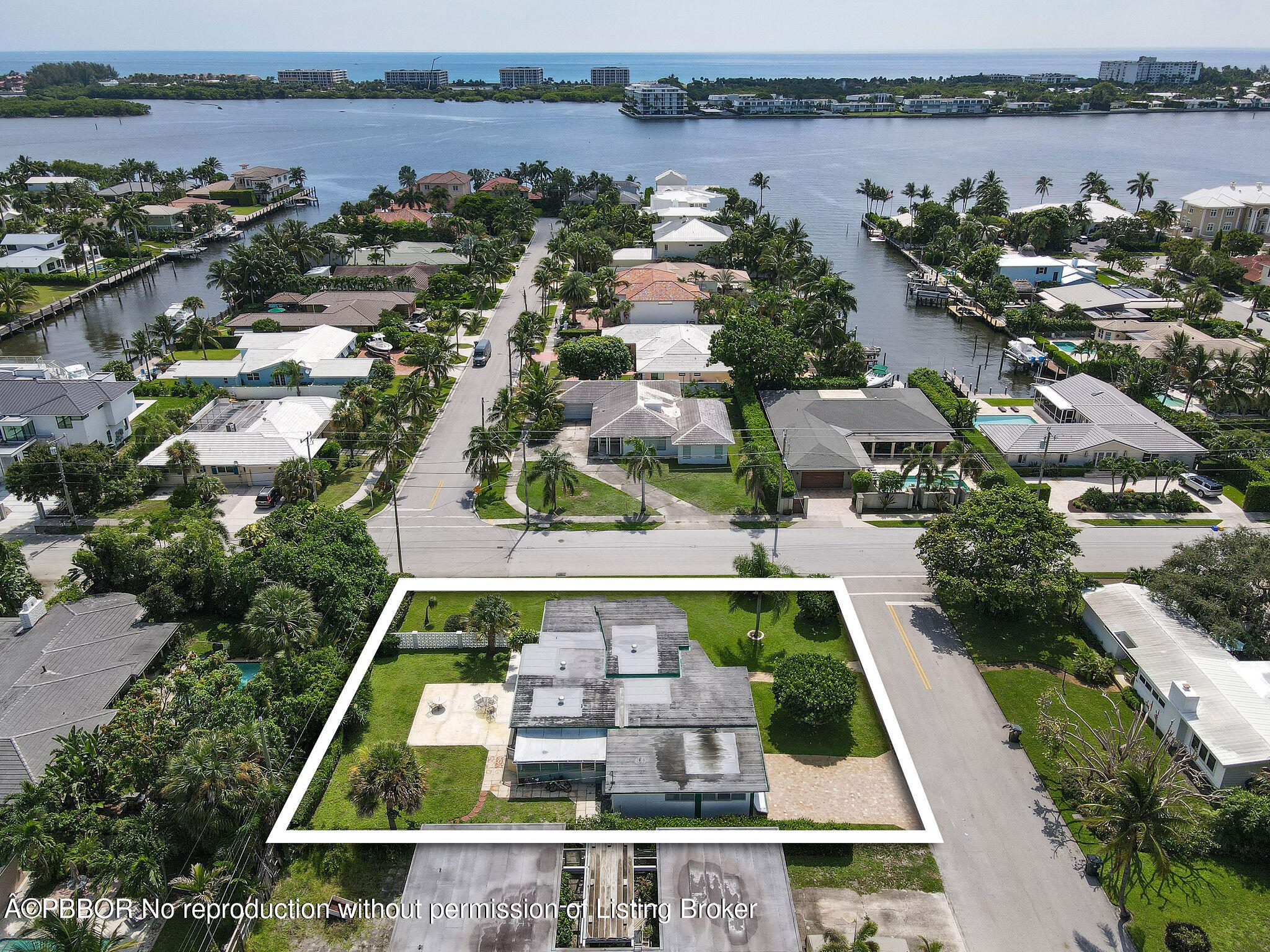 an aerial view of a city with lake view