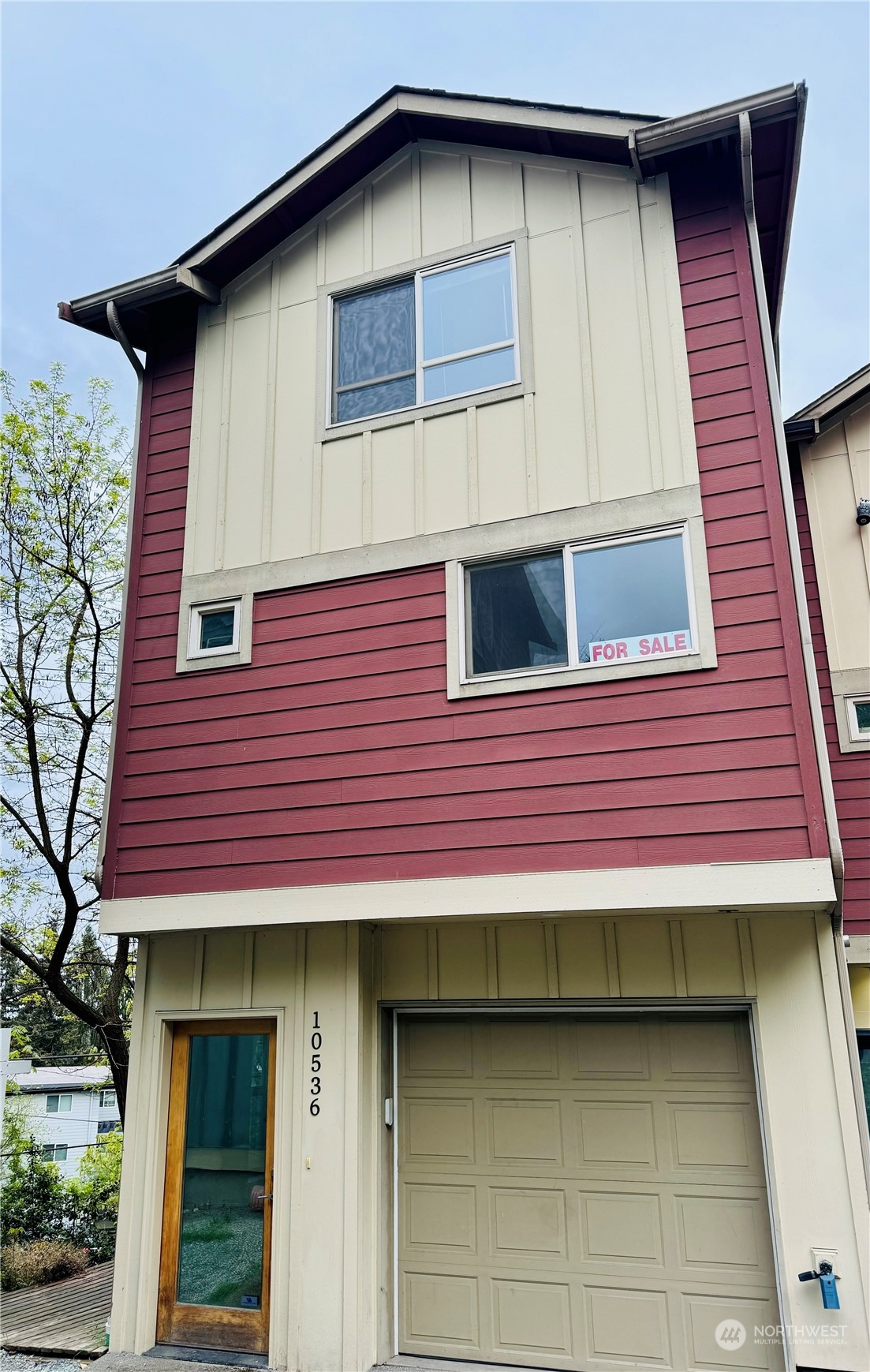 a house that has a window in front of it