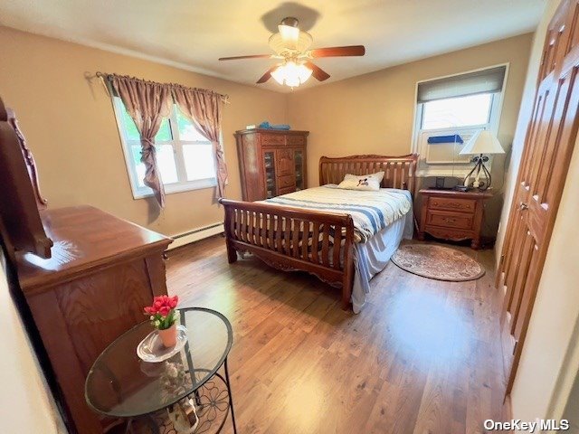 master bedroom with 2 windows -corner unit