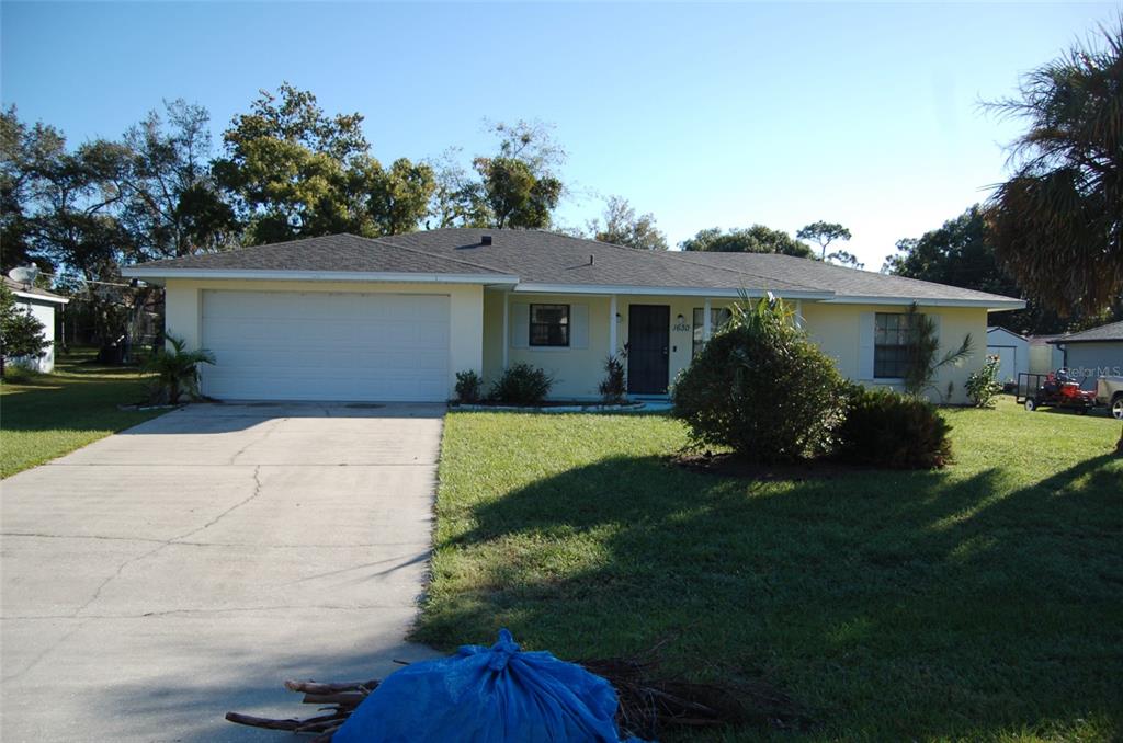 a view of a house with a patio