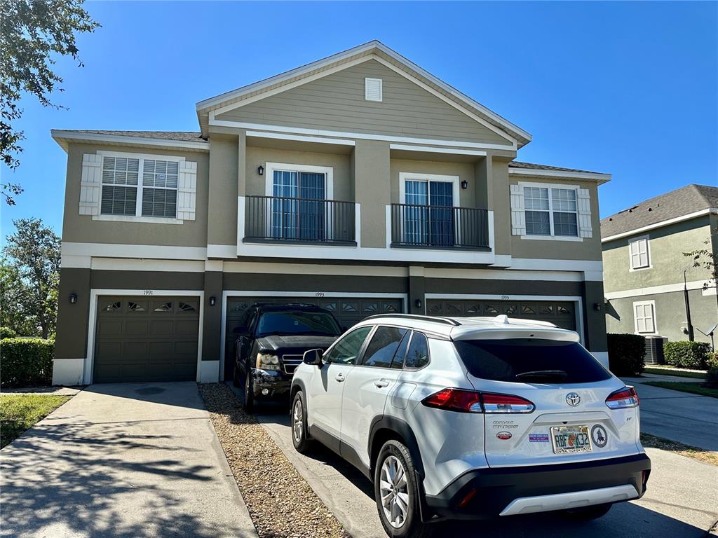 a car parked in front of a house