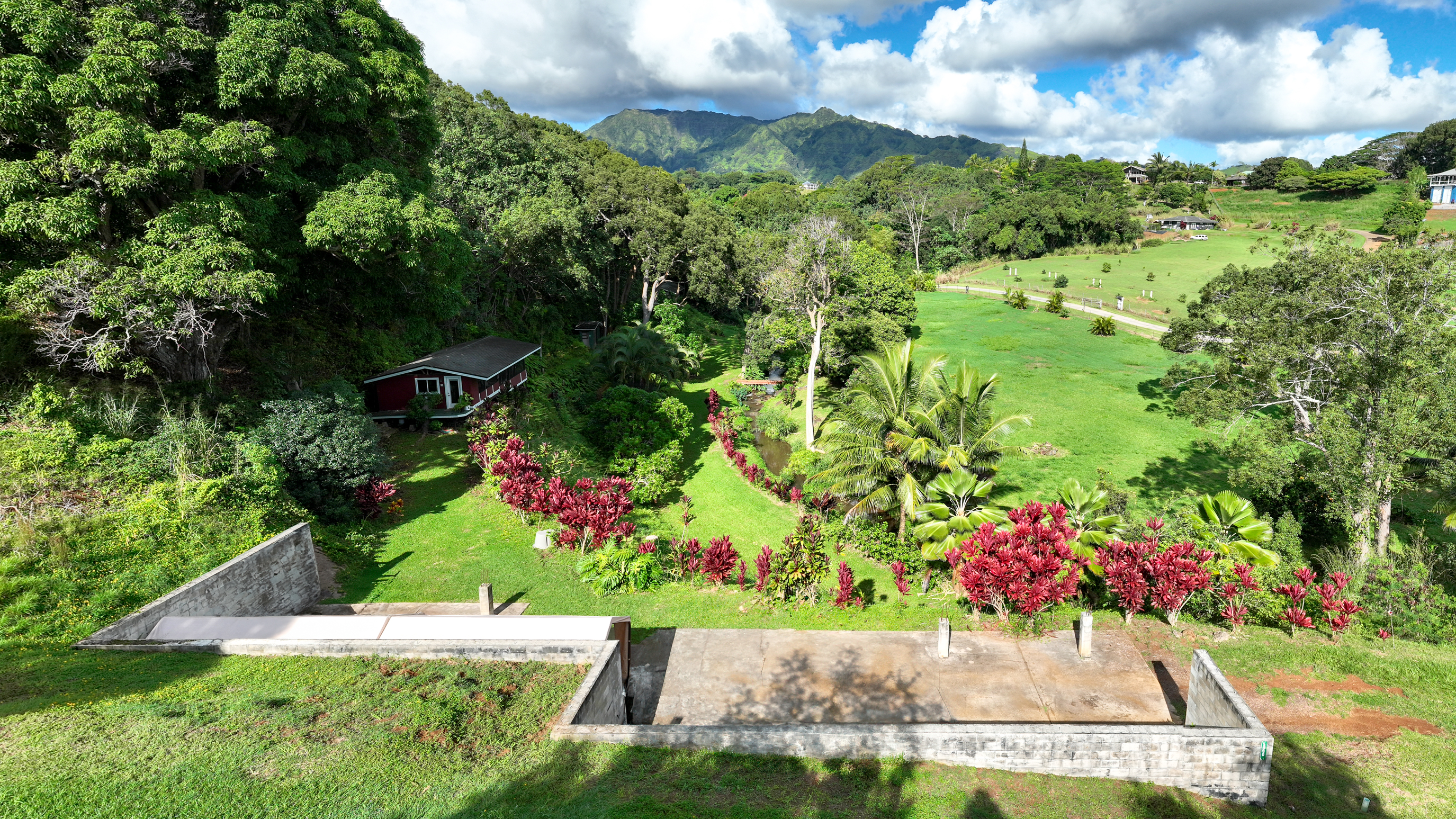 View of Mt. Makaleha and meandering stream from the 2,400+/- sf. foundation home site.