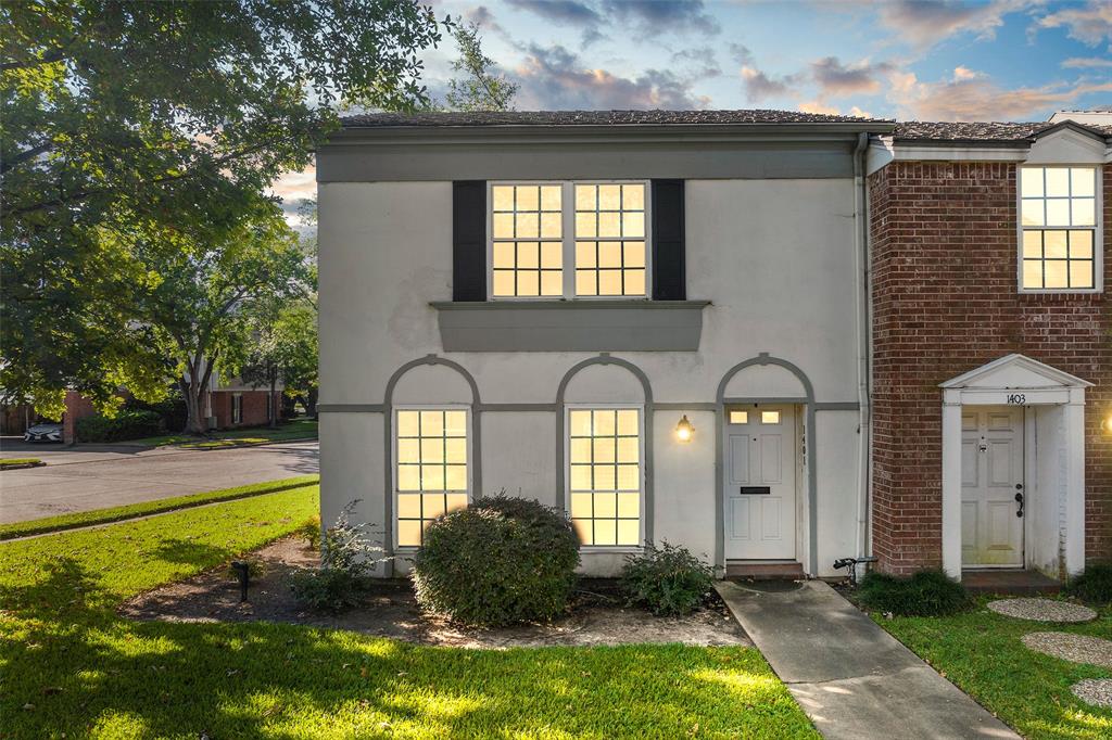 Welcome to 1401 Springrock Ln in the community of Spring Manor, conveniently located in Spring Branch. The 2-story condo has been thoughtfully updated and sits on a prime corner lot at the start of a quaint courtyard with mature trees and landscaping.