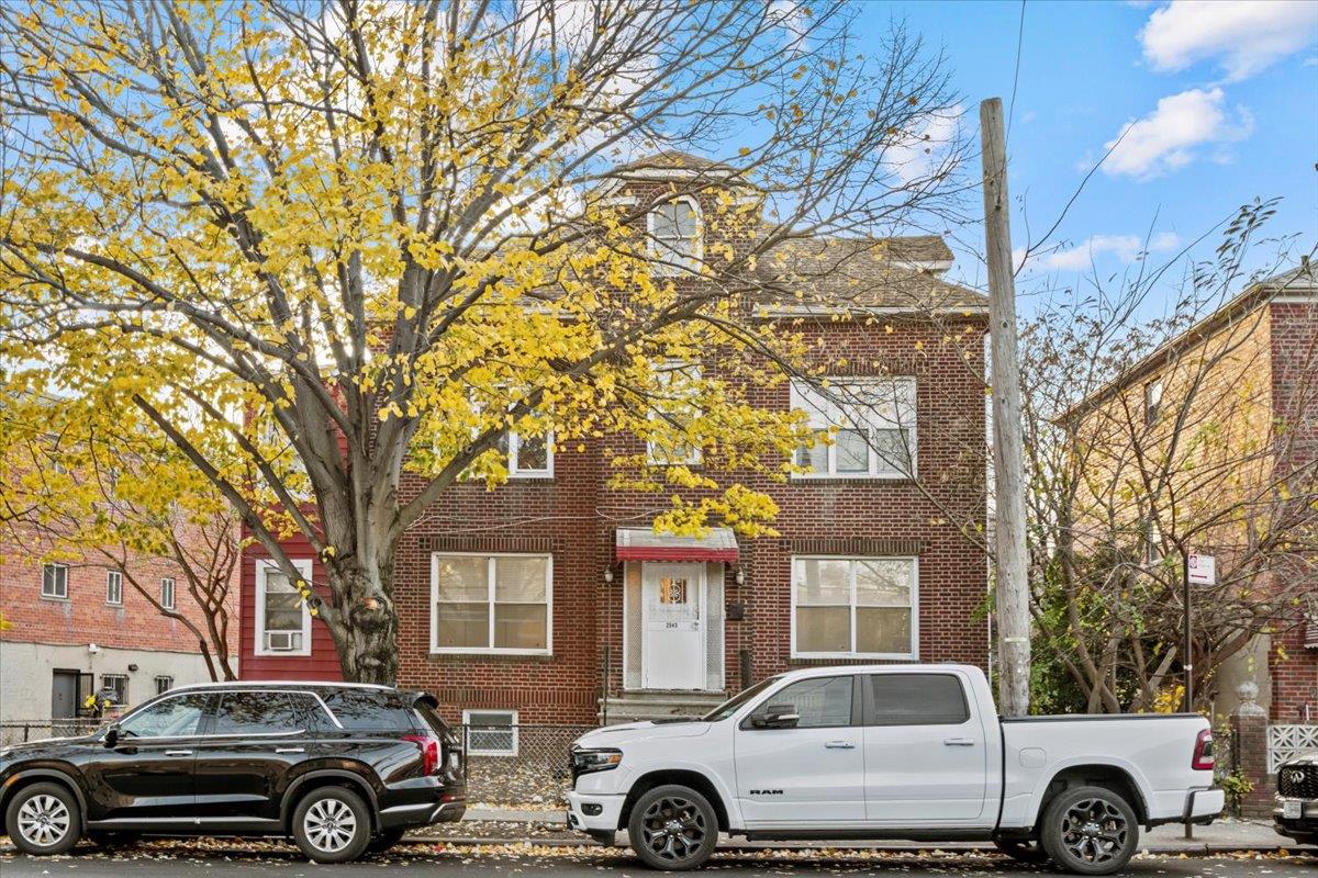 a car parked in front of a house