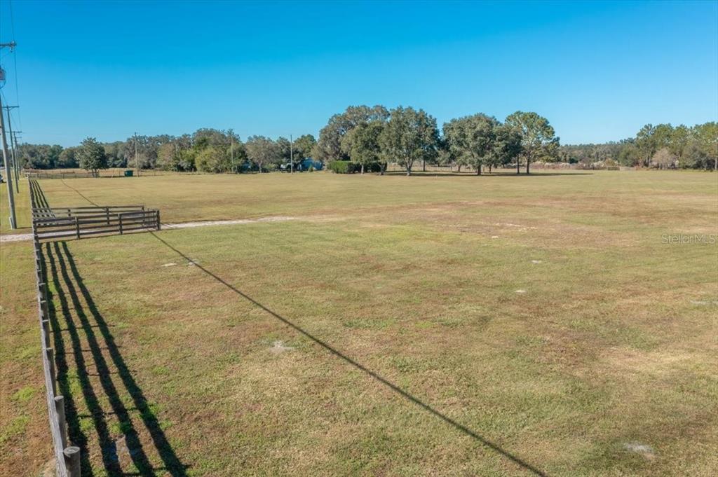 a view of an outdoor space and tennis court