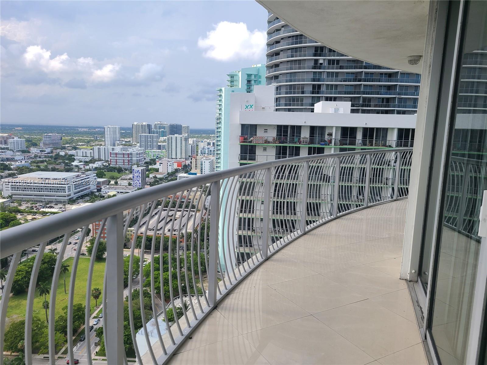 a view of balcony with city view