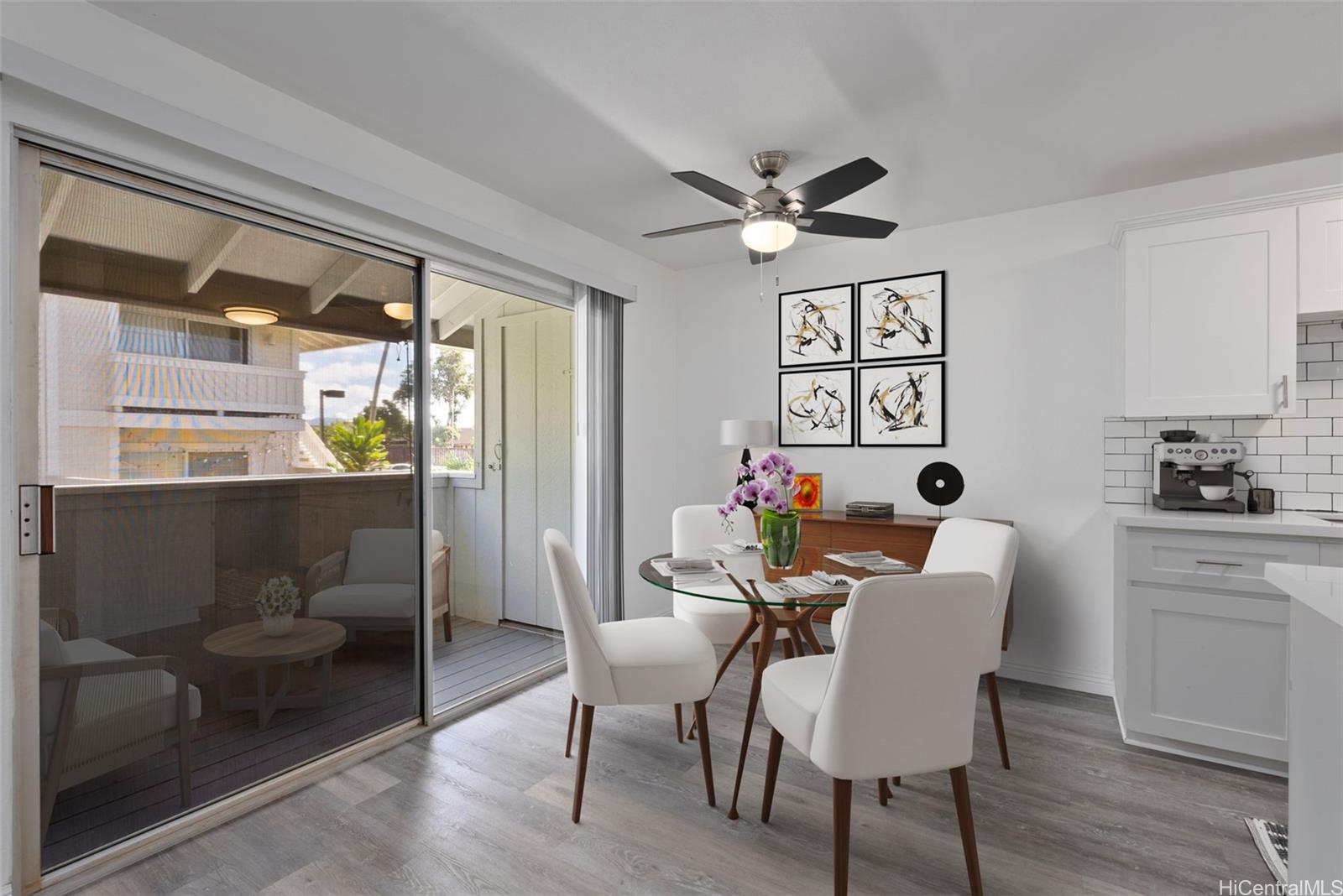 a dining room with furniture and window