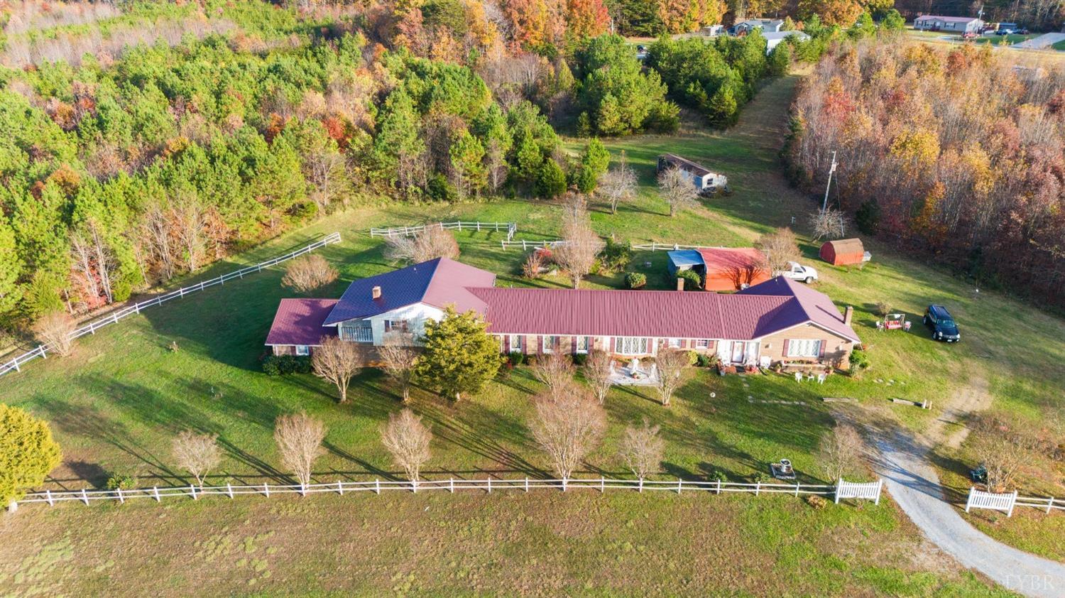 an aerial view of residential house with outdoor space