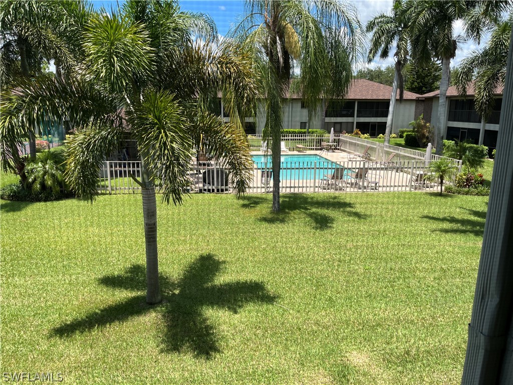 a view of a garden with a fountain