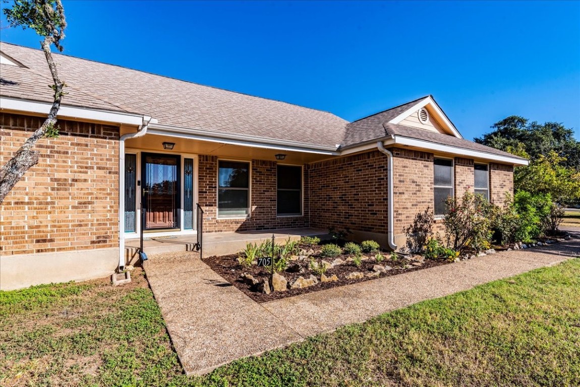 front view of a house with a patio