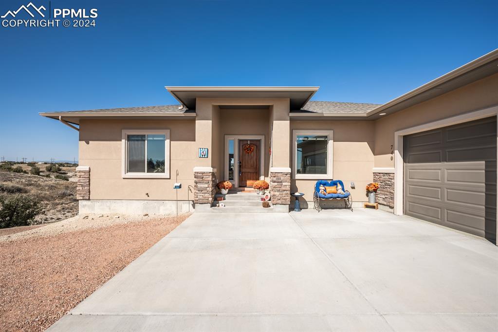 a view of a house with a patio