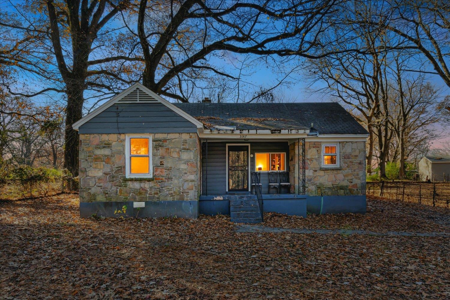 Bungalow-style house with a porch