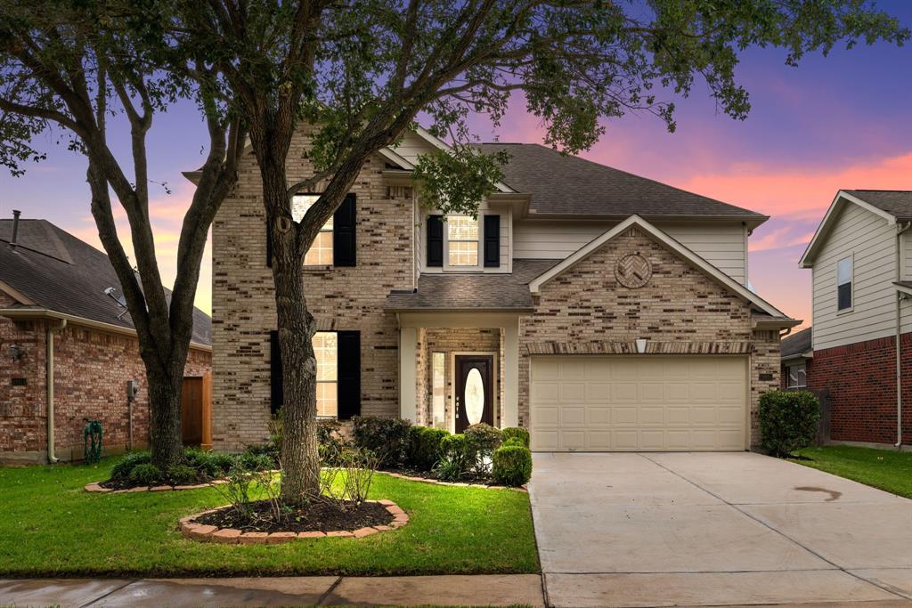 front view of house with a yard