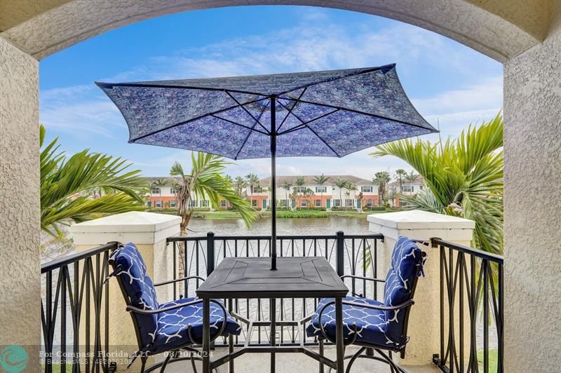 a view of a patio on the roof deck