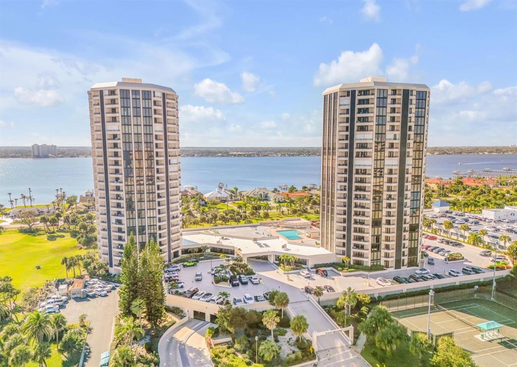 a view of ocean with a multi story building