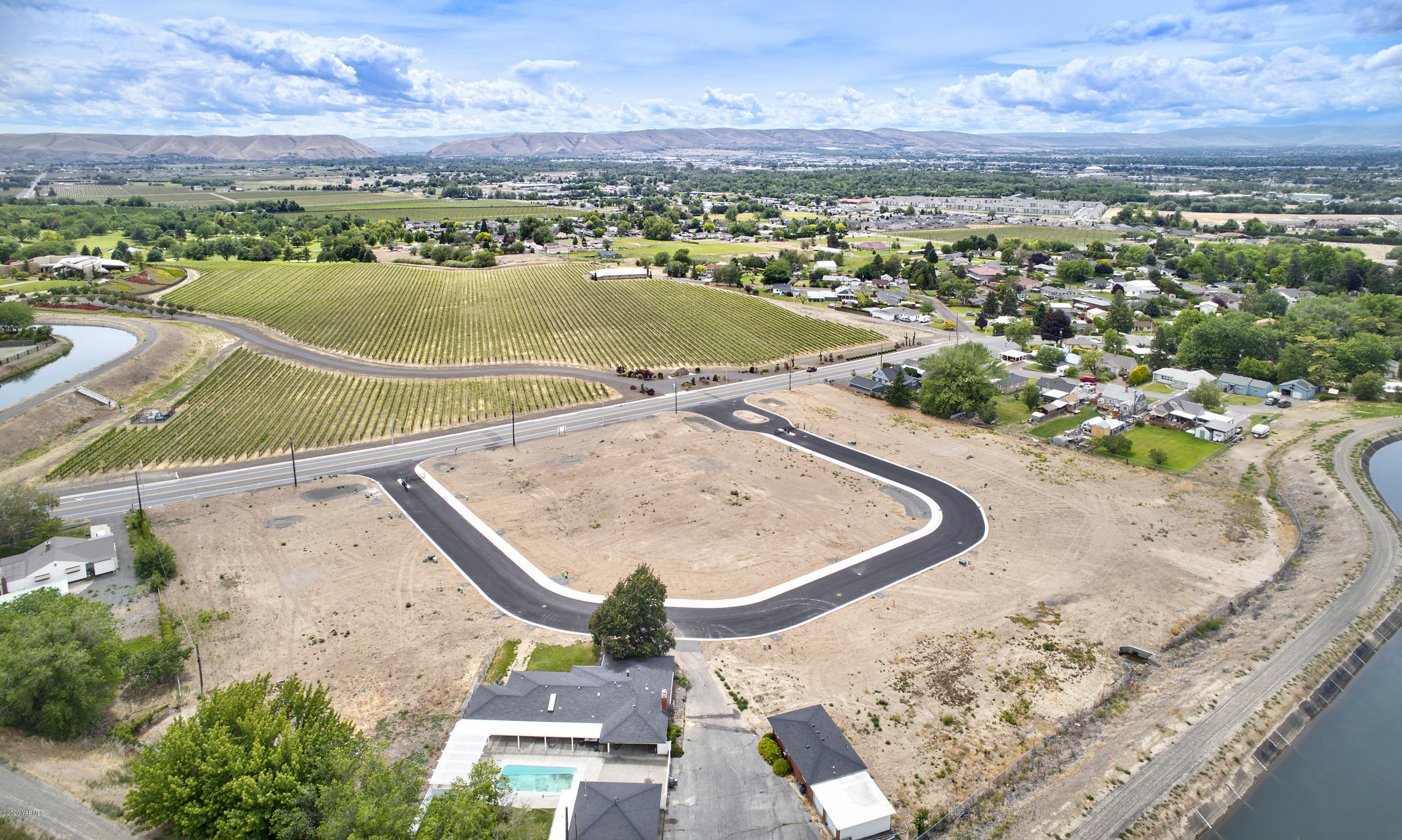 an aerial view of a swimming pool and outdoor space