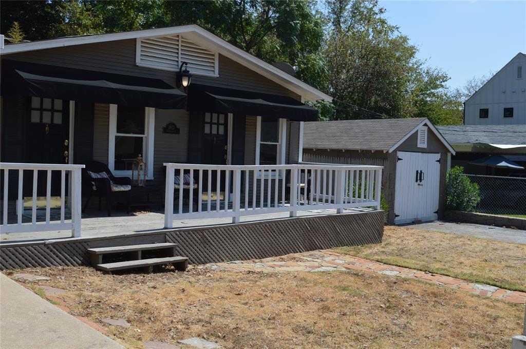 a view of a house with a roof deck