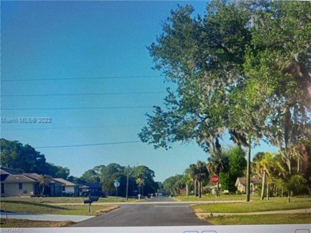 a view of a yard in front of a house