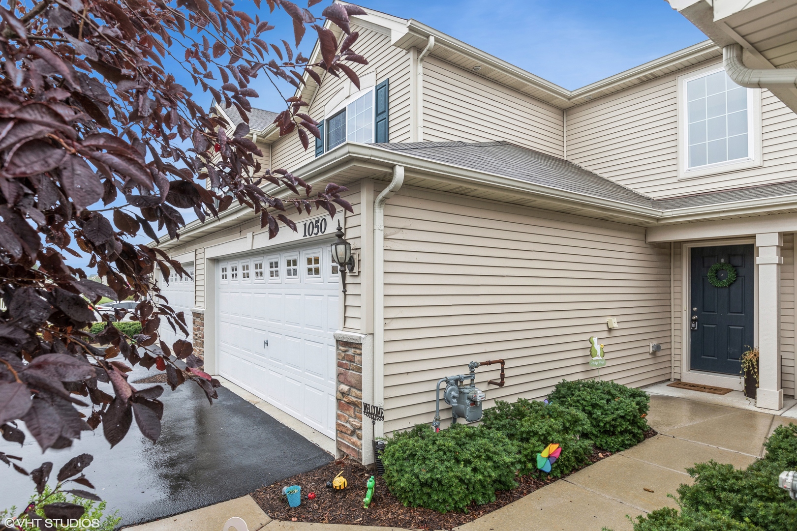 a view of a house with a garage