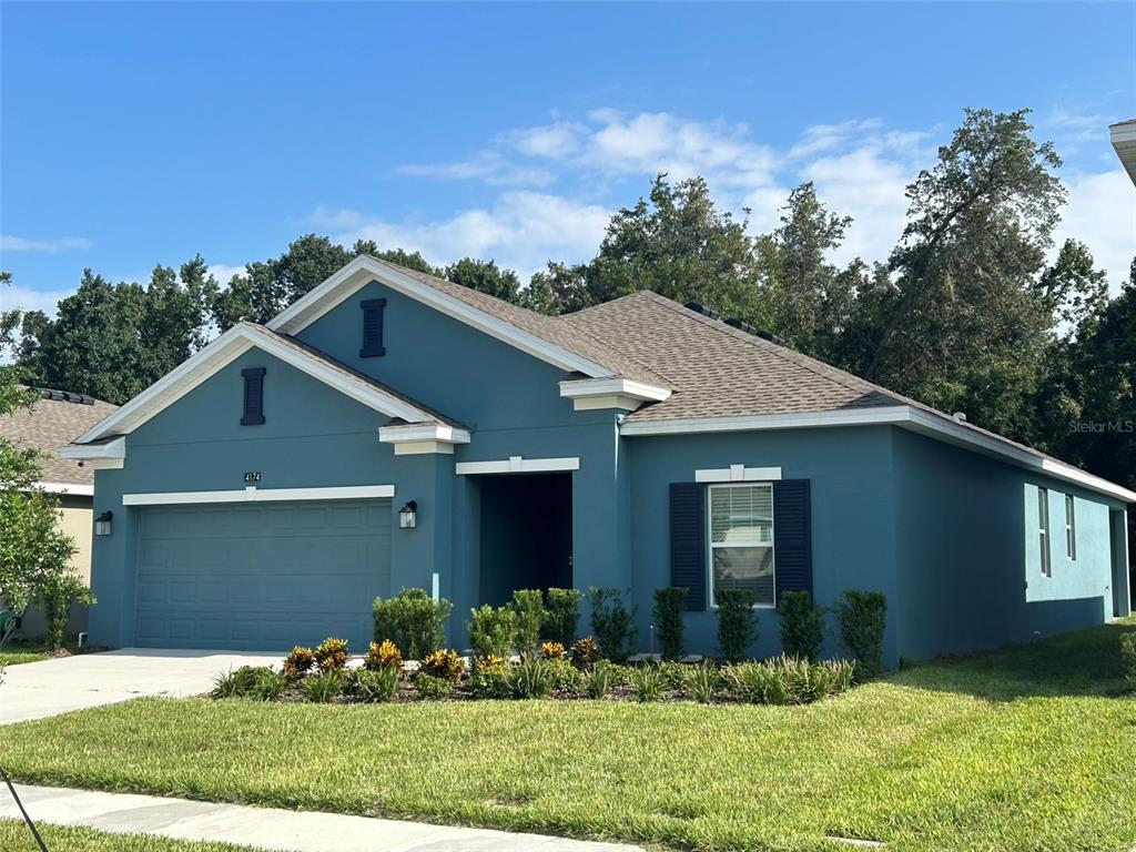 front view of house with a yard