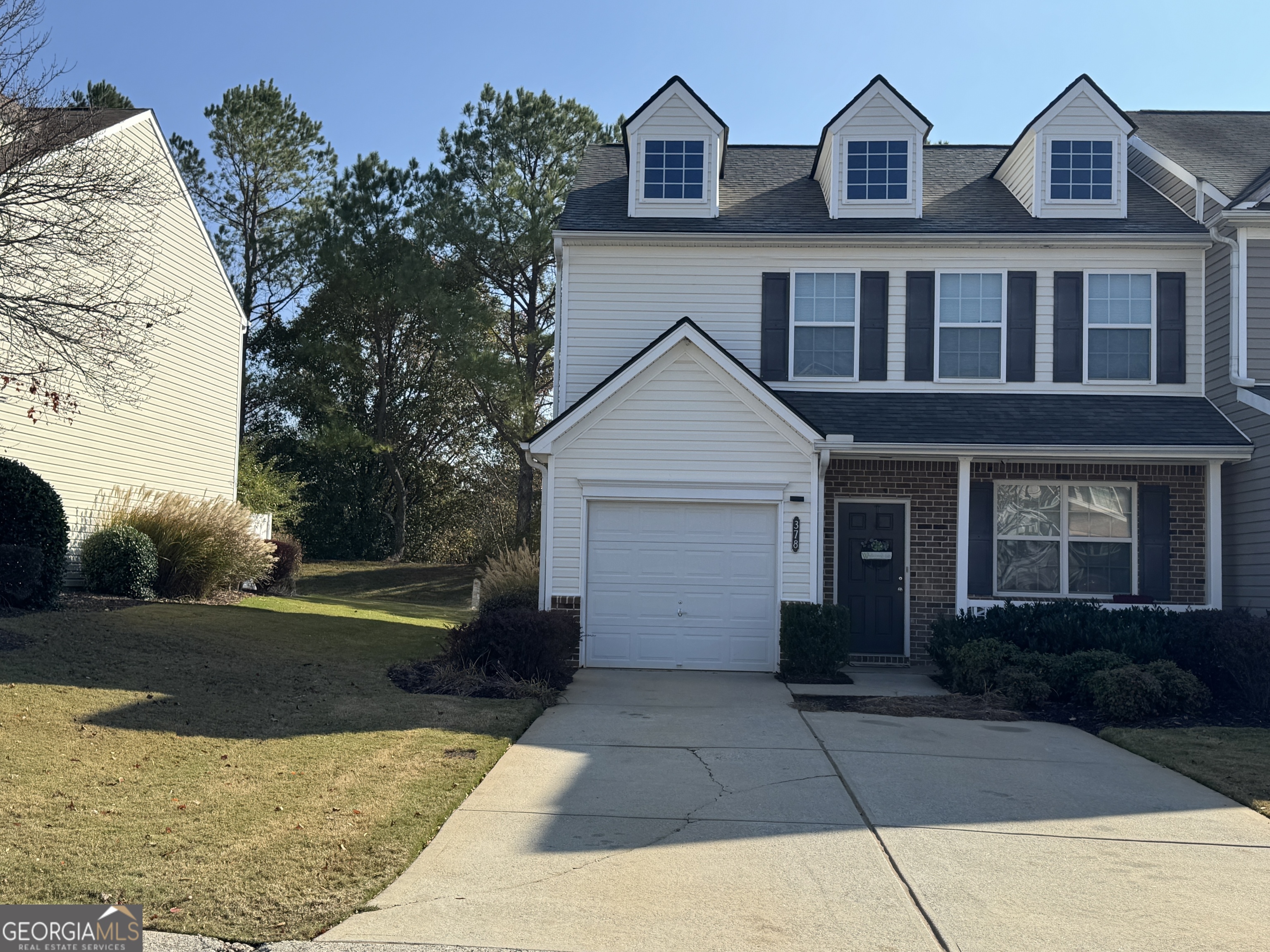 front view of house with a yard