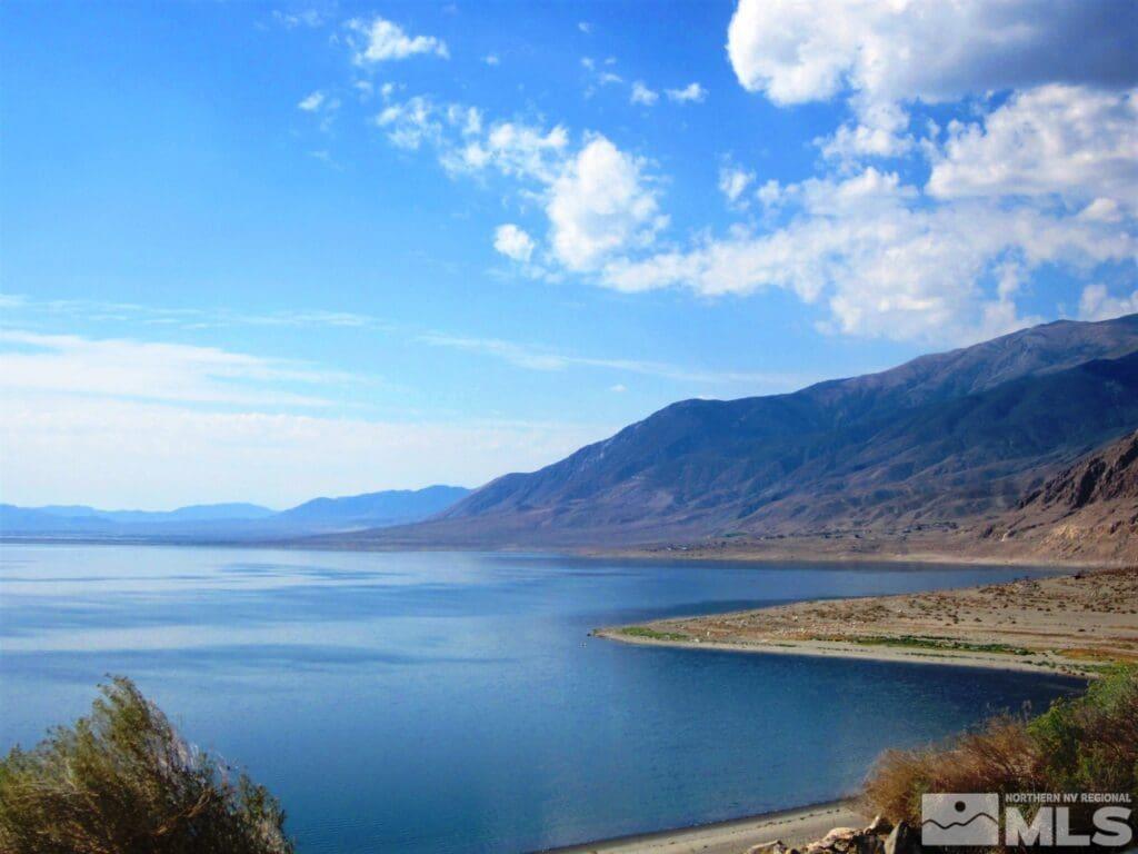 a view of ocean with mountain