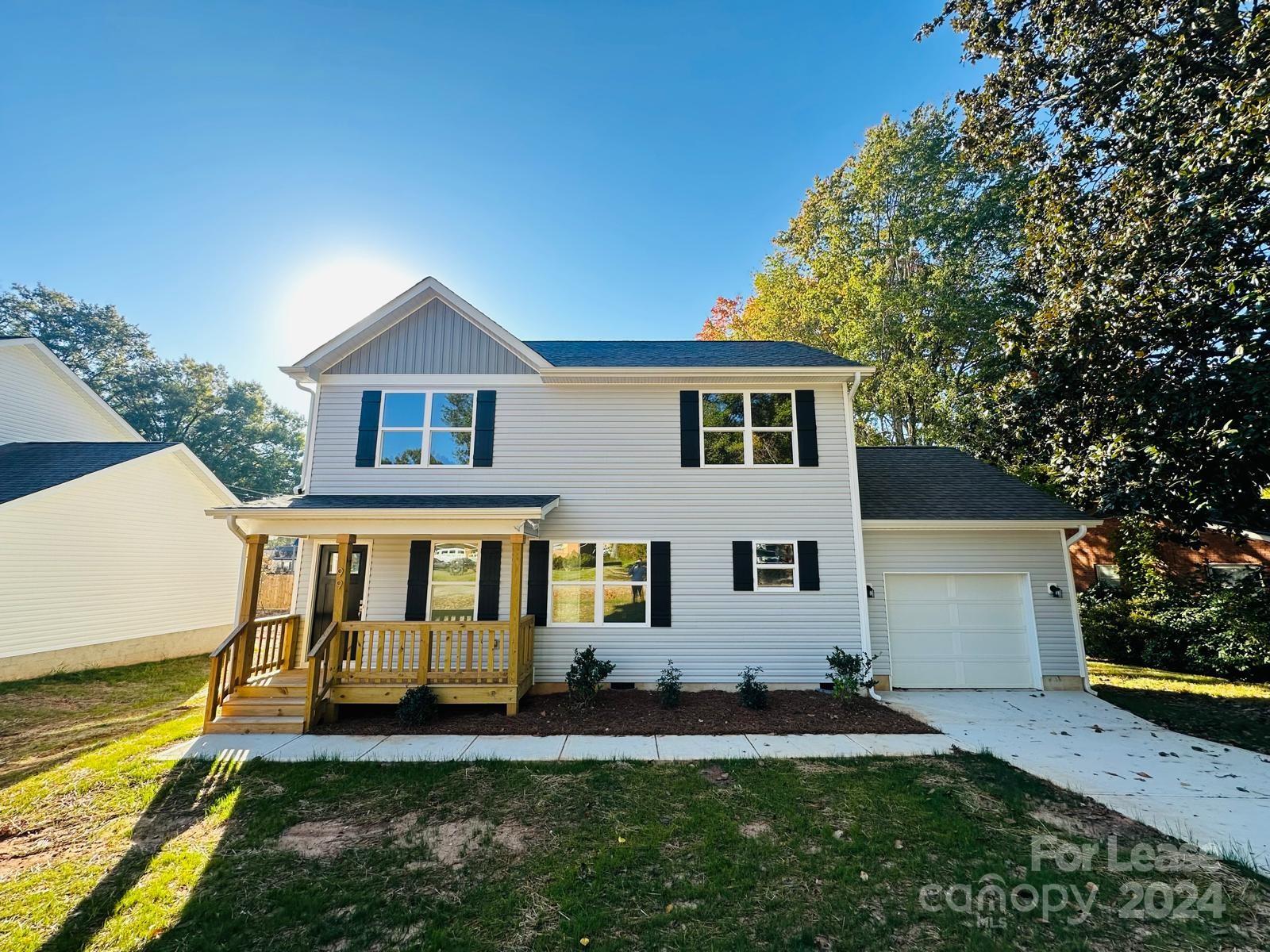 front view of a house with a yard