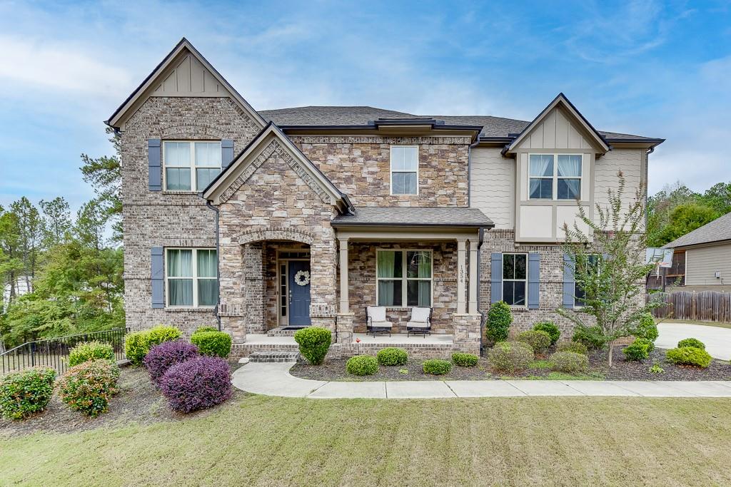 front view of a house with a yard