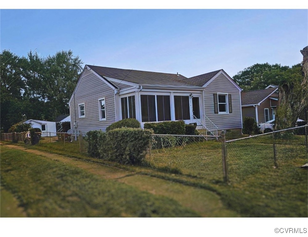 a view of a house with a big yard