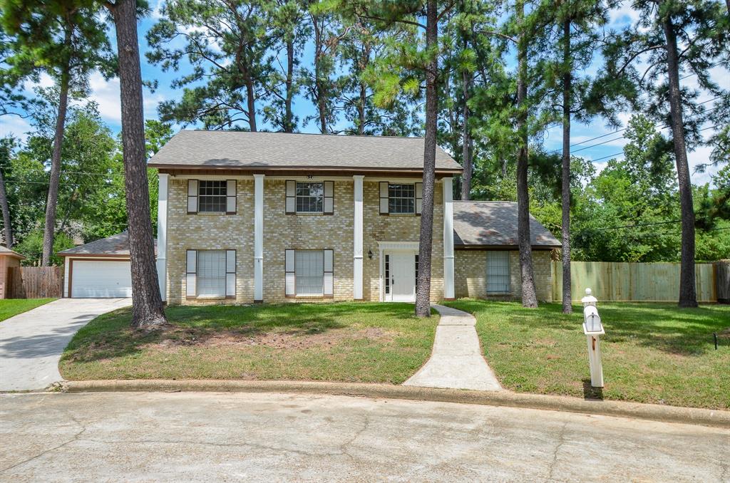 front view of a house and a yard