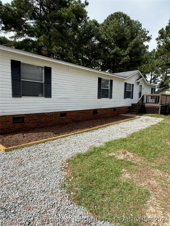 a house with trees in the background