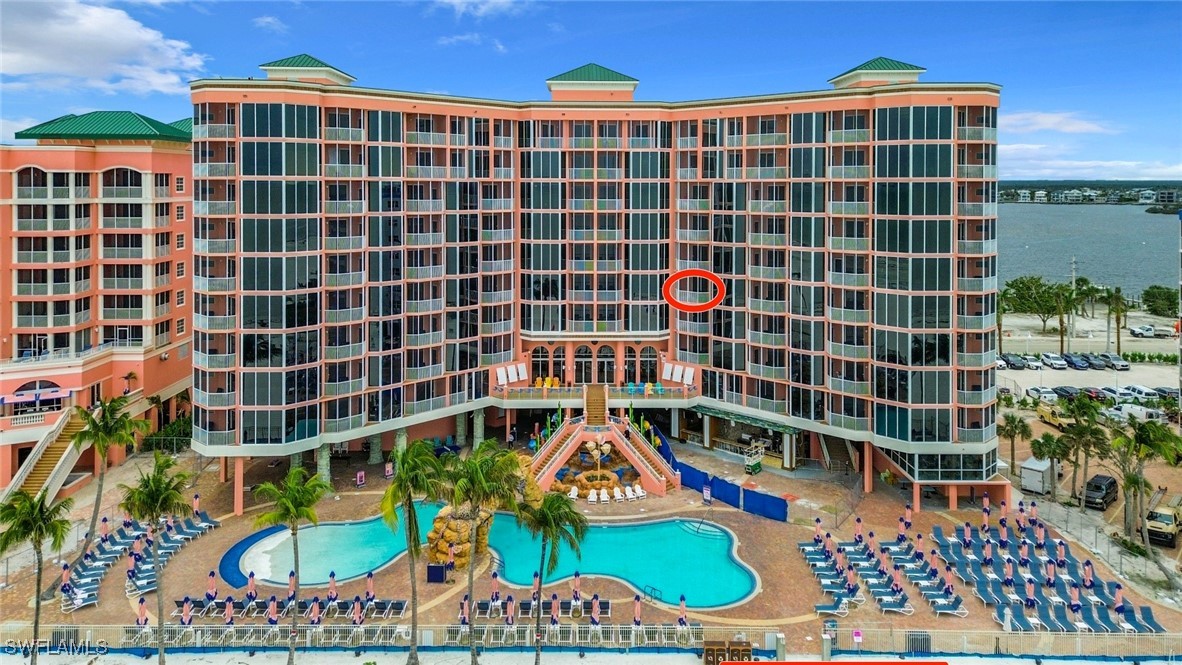 a view of a blue building with a outdoor space