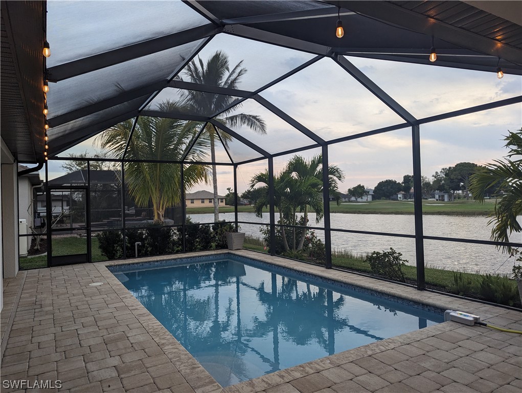 a view of a swimming pool with a porch