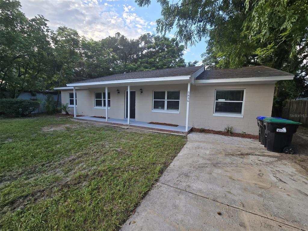 front view of a house with a yard