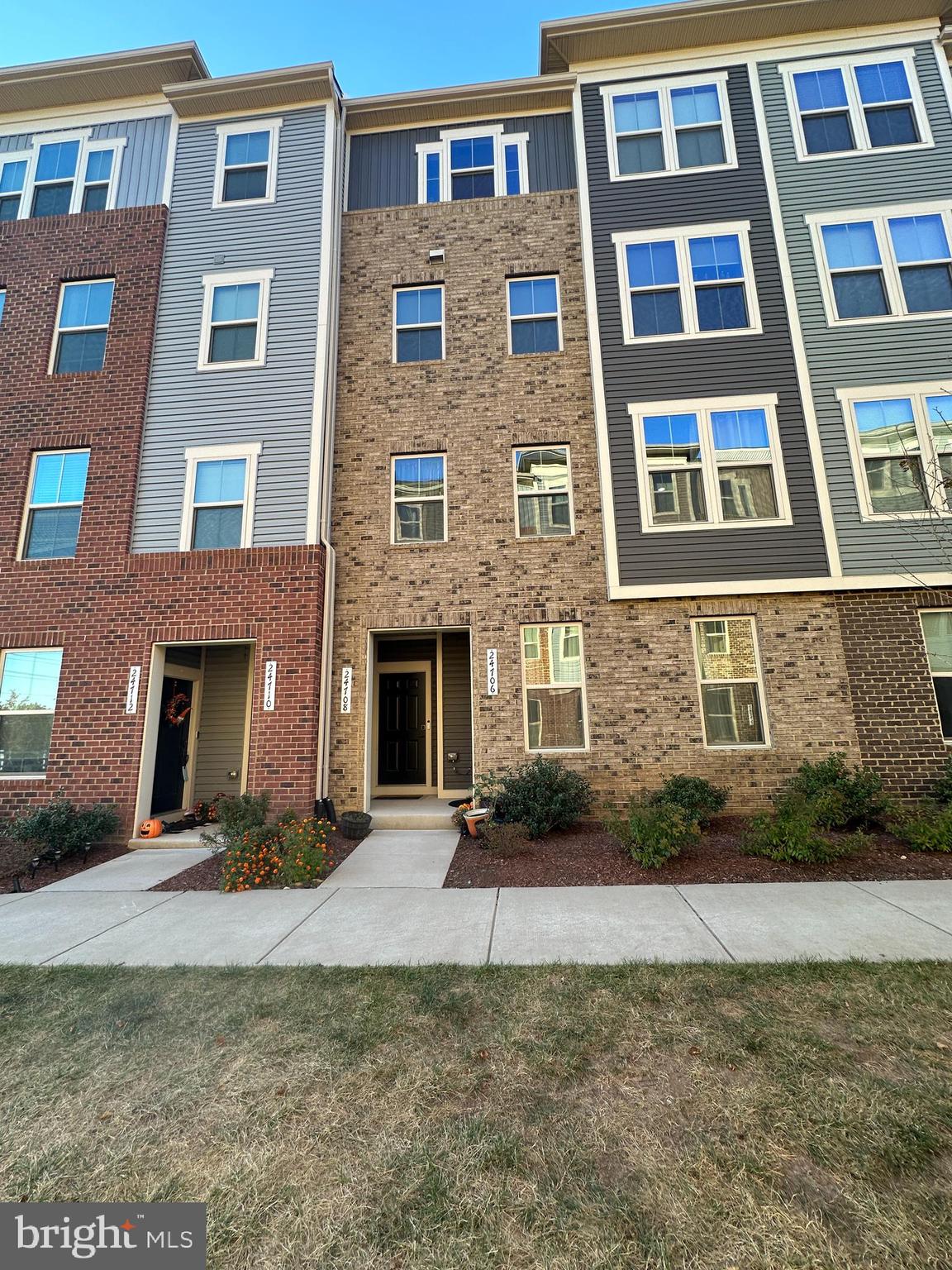 a front view of a building with yard