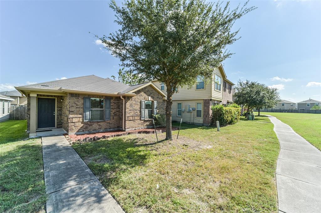 a house with trees in the background