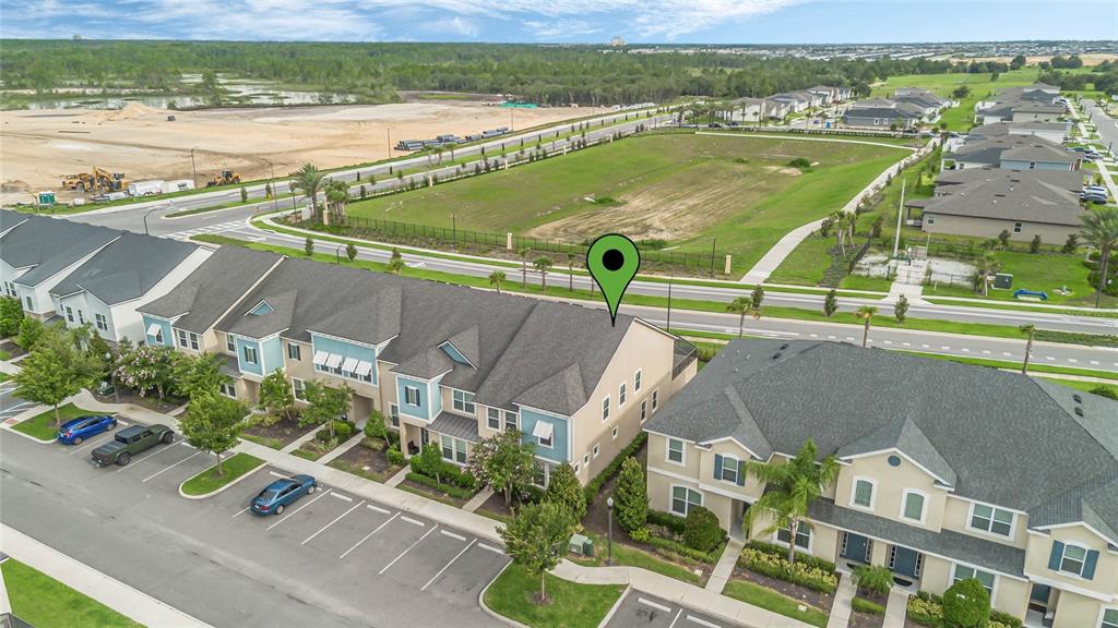 an aerial view of a house with a outdoor space