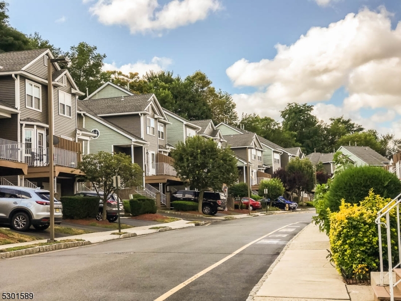 a view of a street with cars