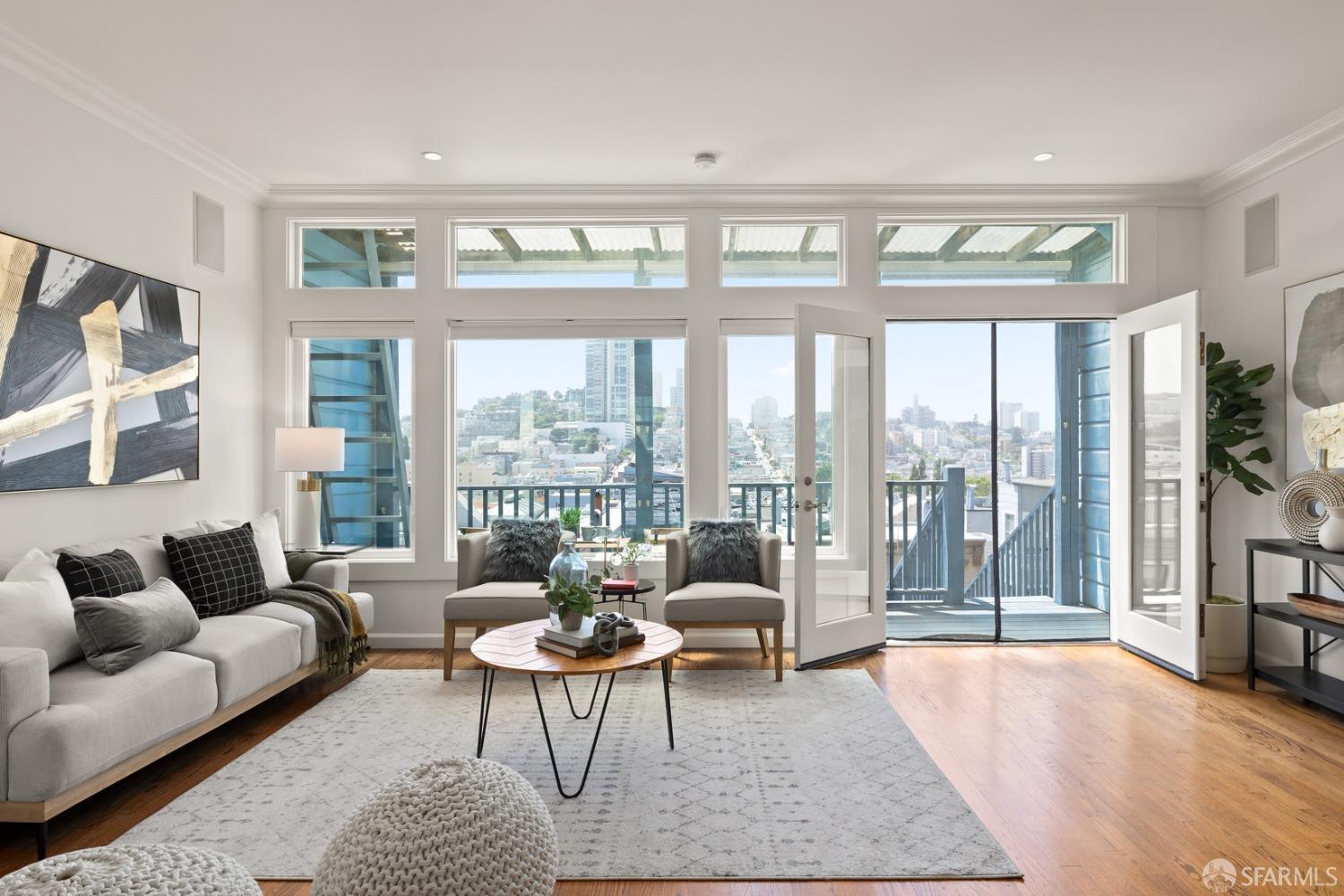 a living room with furniture lamp and a floor to ceiling window